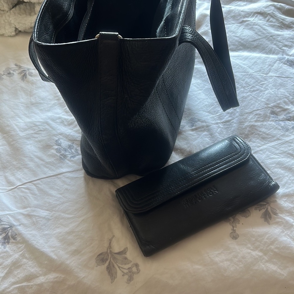 Authentic Kenneth Cole Reaction black leather handbag and matching wallet.